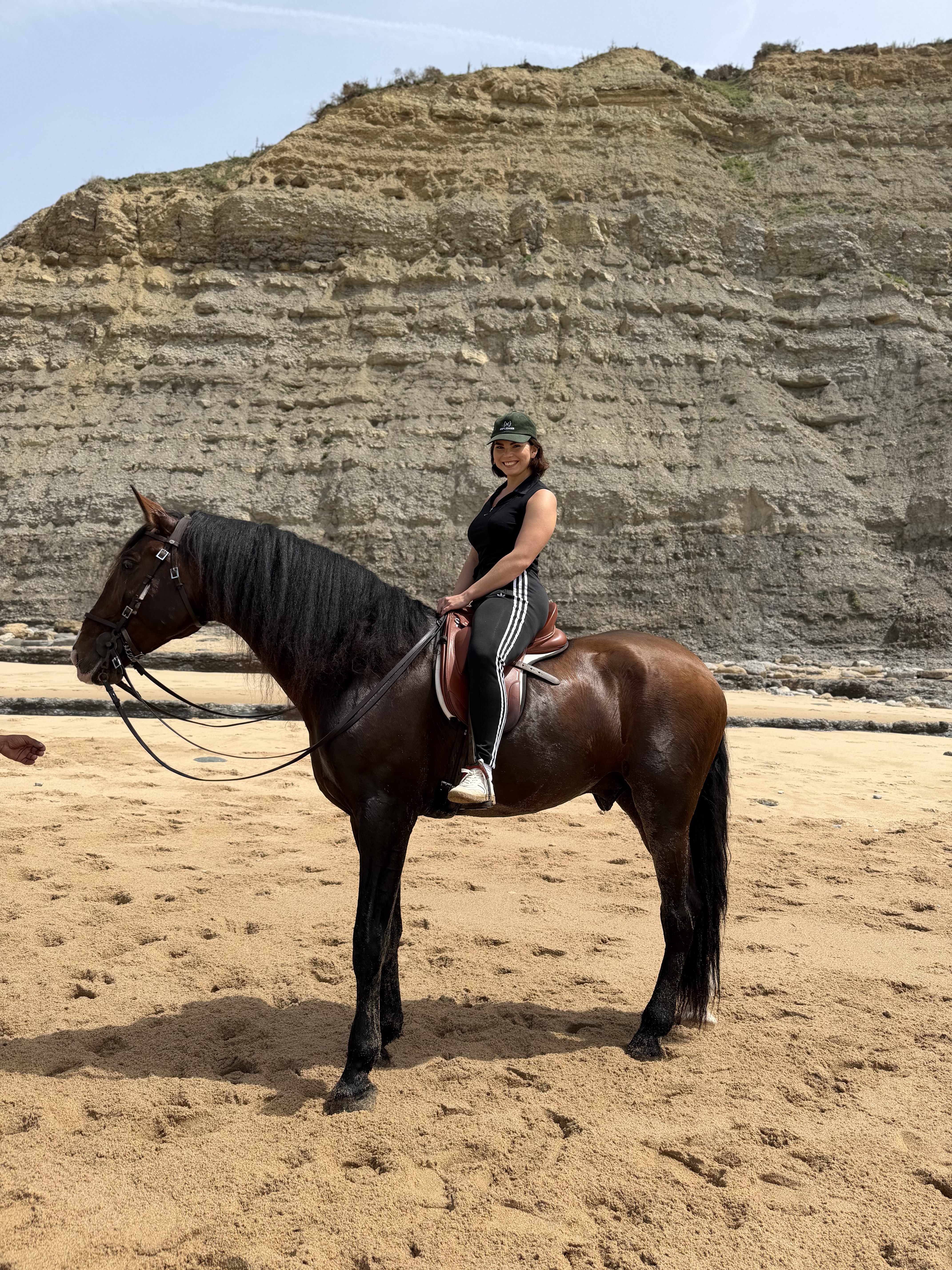 Horse riding on beach